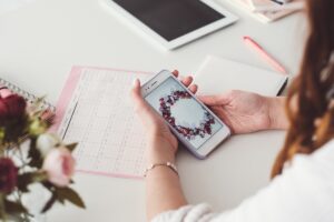 Woman using a social media planner