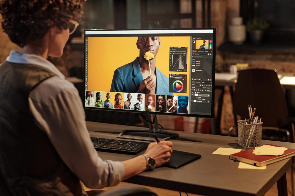 Person editing a photo on PC